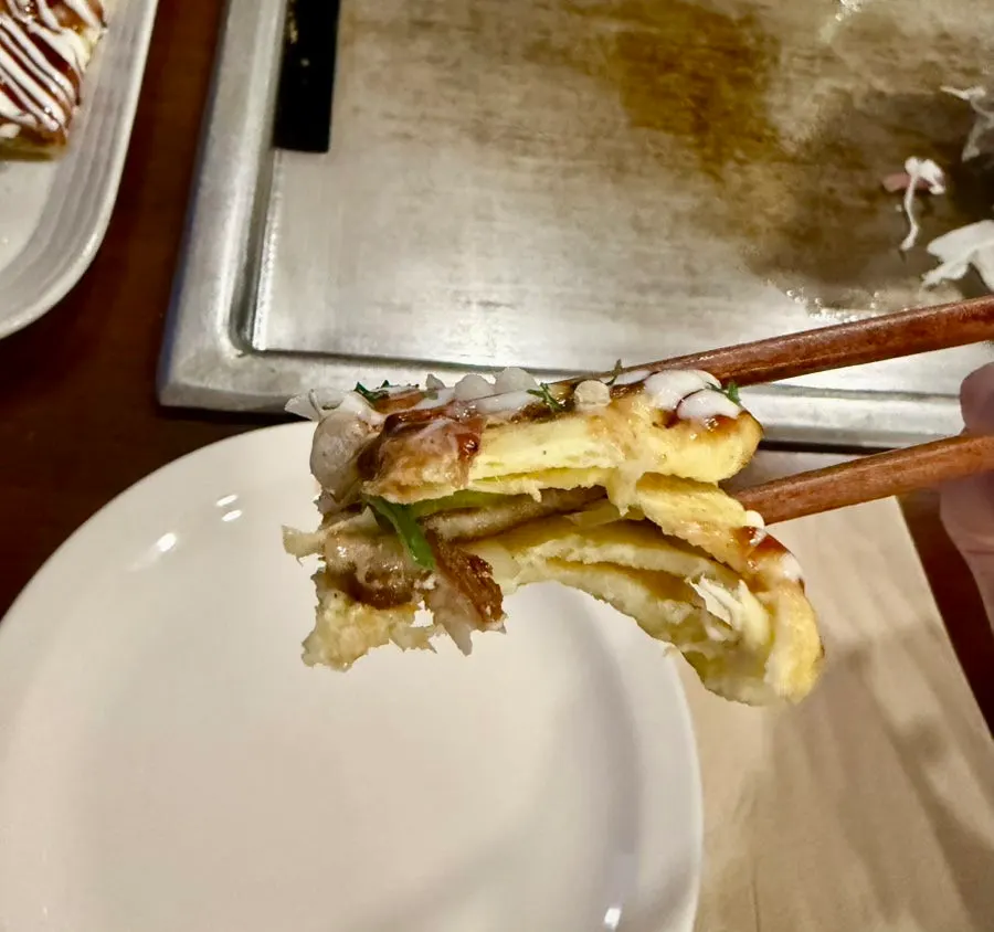 Close-up of the rolled-omelet-shaped donpeyaki