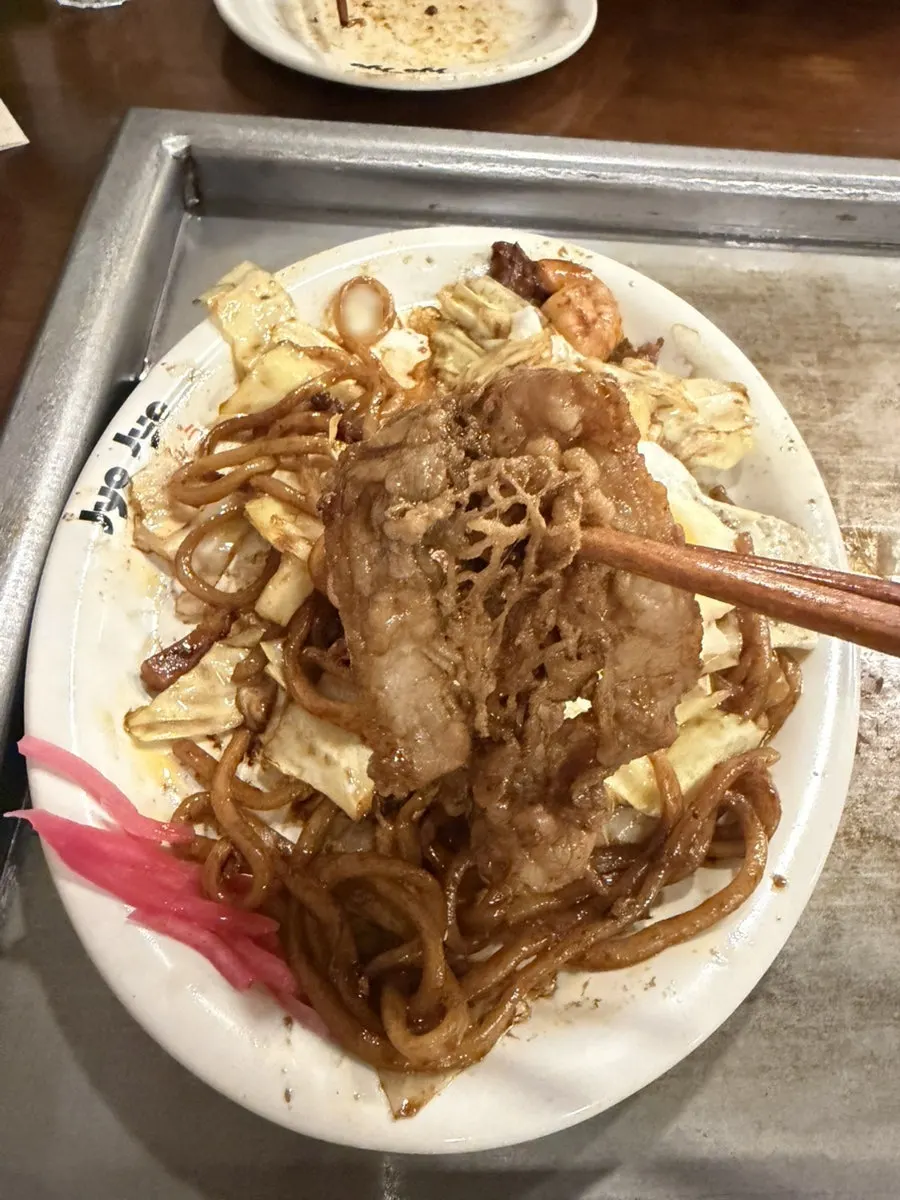 Yakisoba mixed with the burst egg yolk