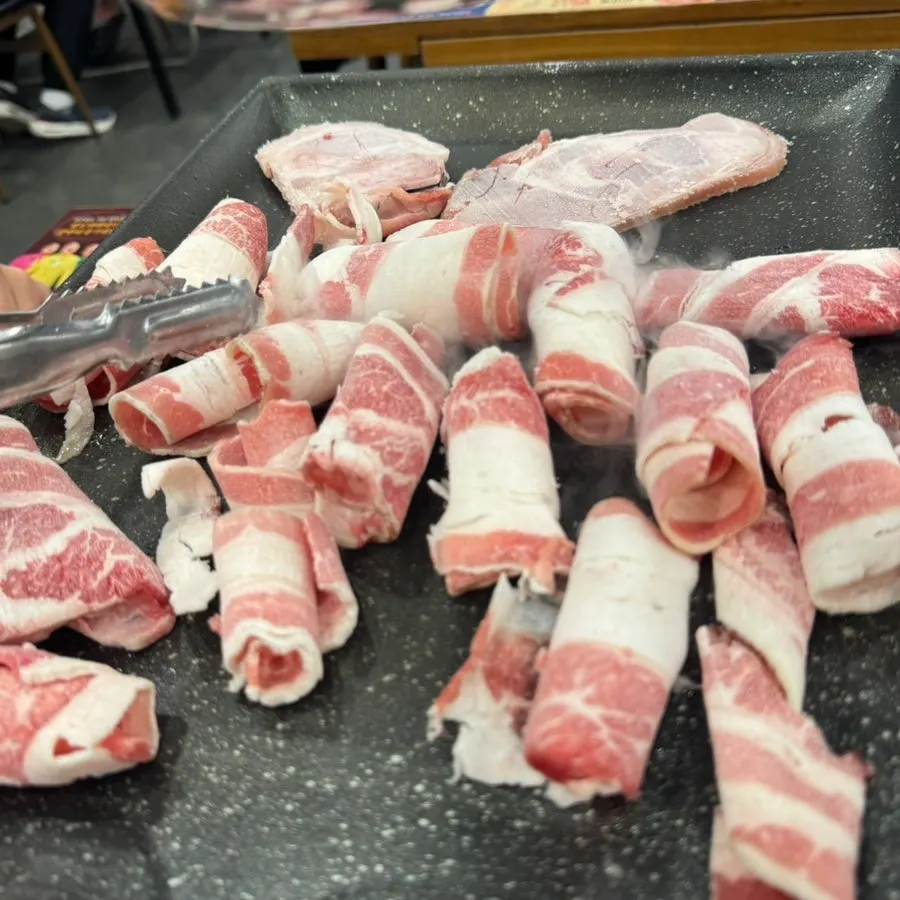 Beef brisket and pork trotter cuts brought to the plate