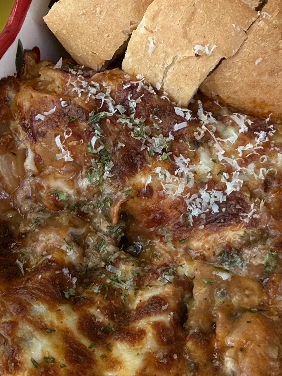 Grandma Lasagna served with a baguette