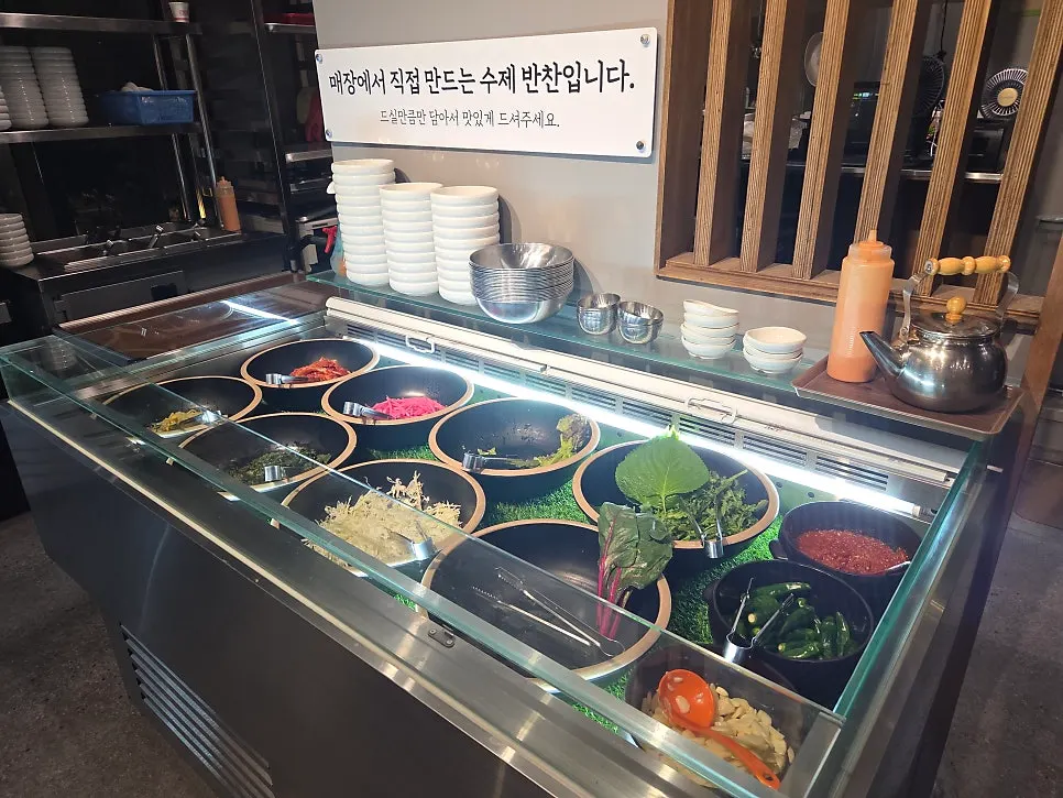 Side dishes served on a silver tray at Bulhyangjip