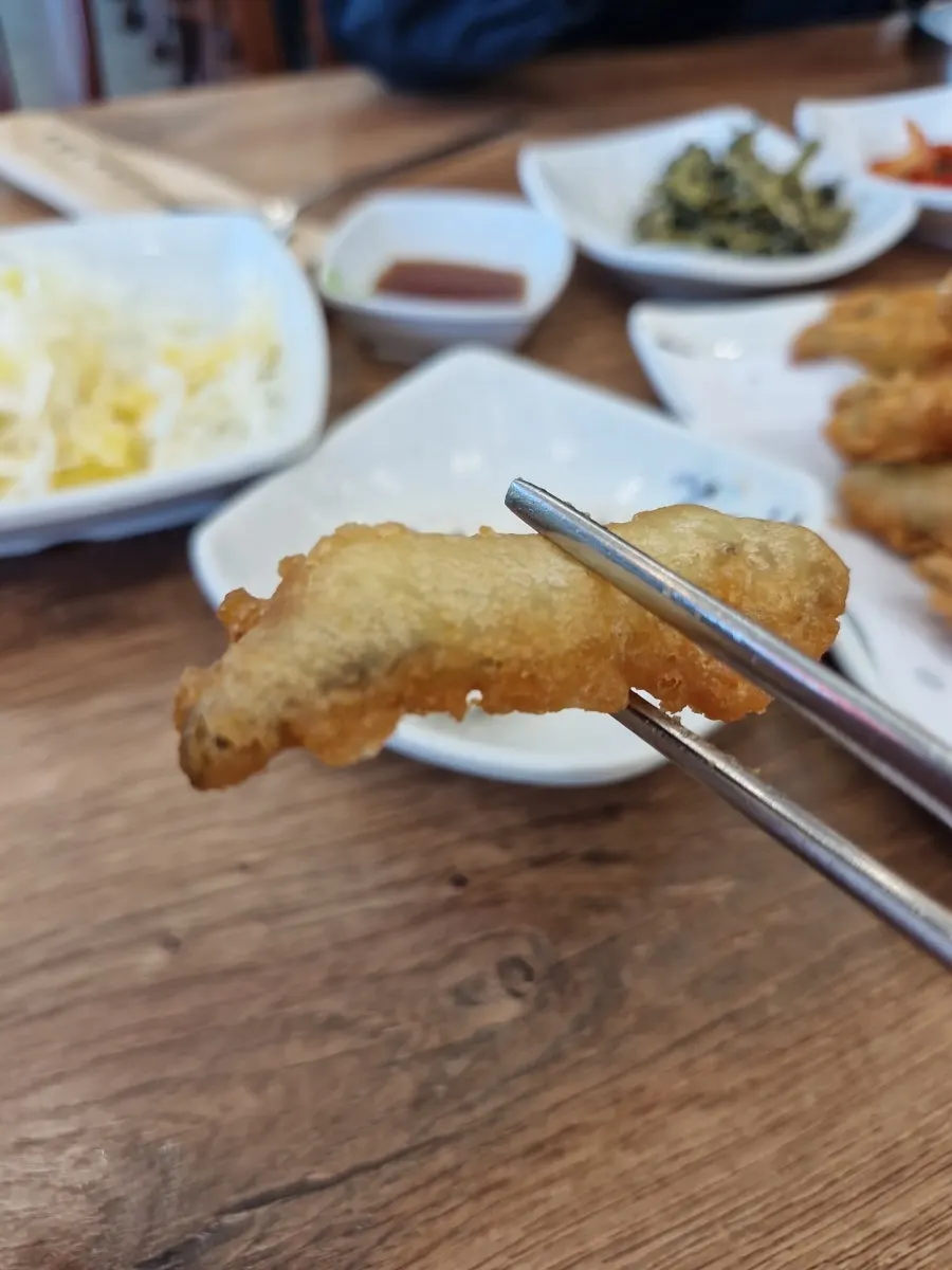 A neatly set table with utensils