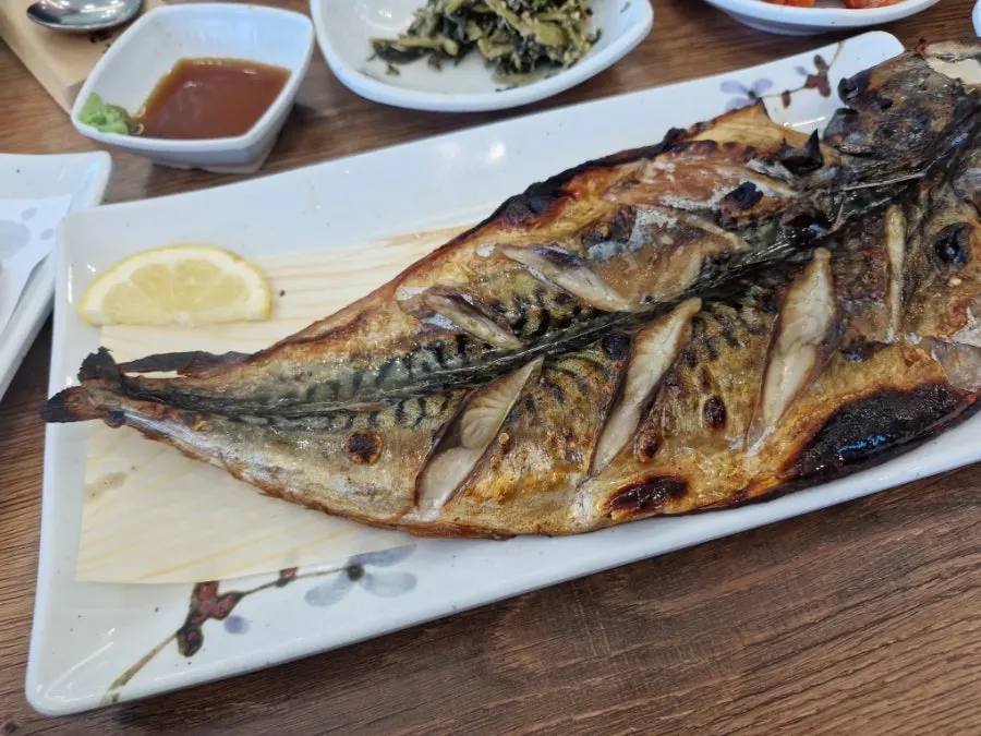 Golden, crisply grilled hwadeok fish