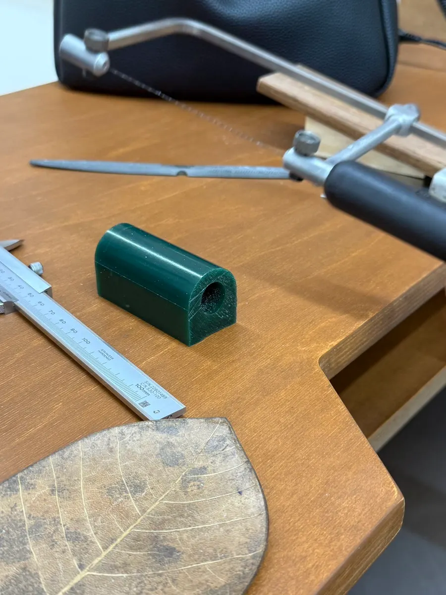 A wax ring freely shaped by hand