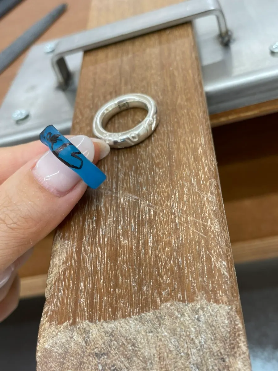 Wax ring hand-engraved with a birthday date and heart