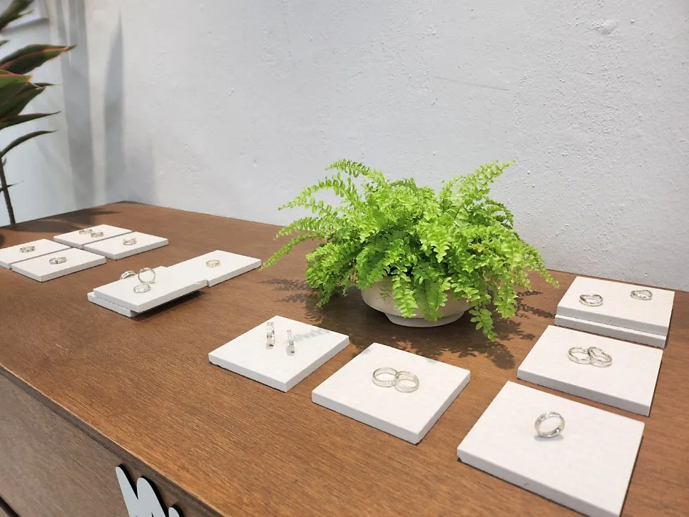 Sample rings made in-house on display at Munak