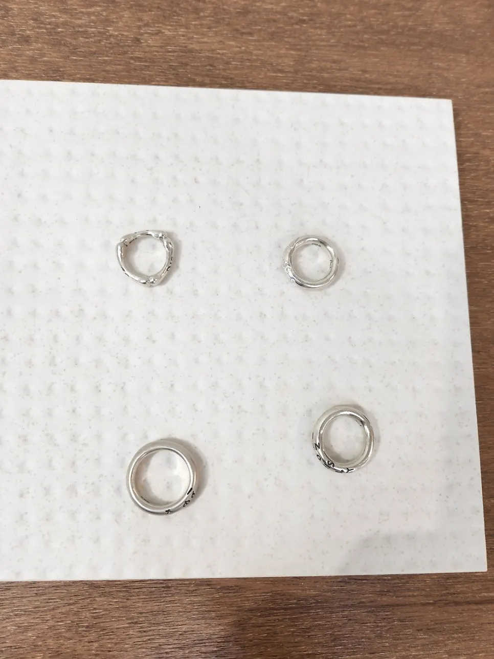 Trying on a sample ring on a finger