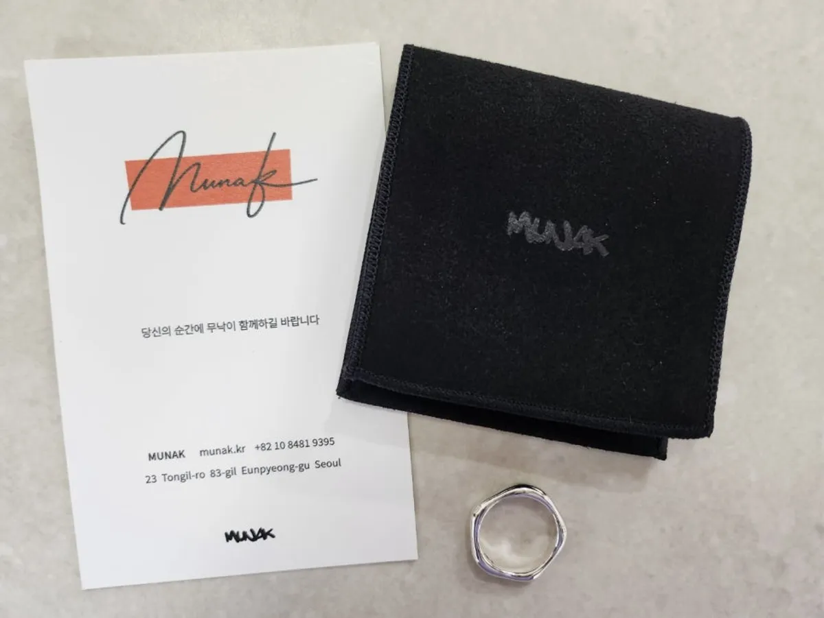 The finished one-of-a-kind ring made through wax carving at Munak