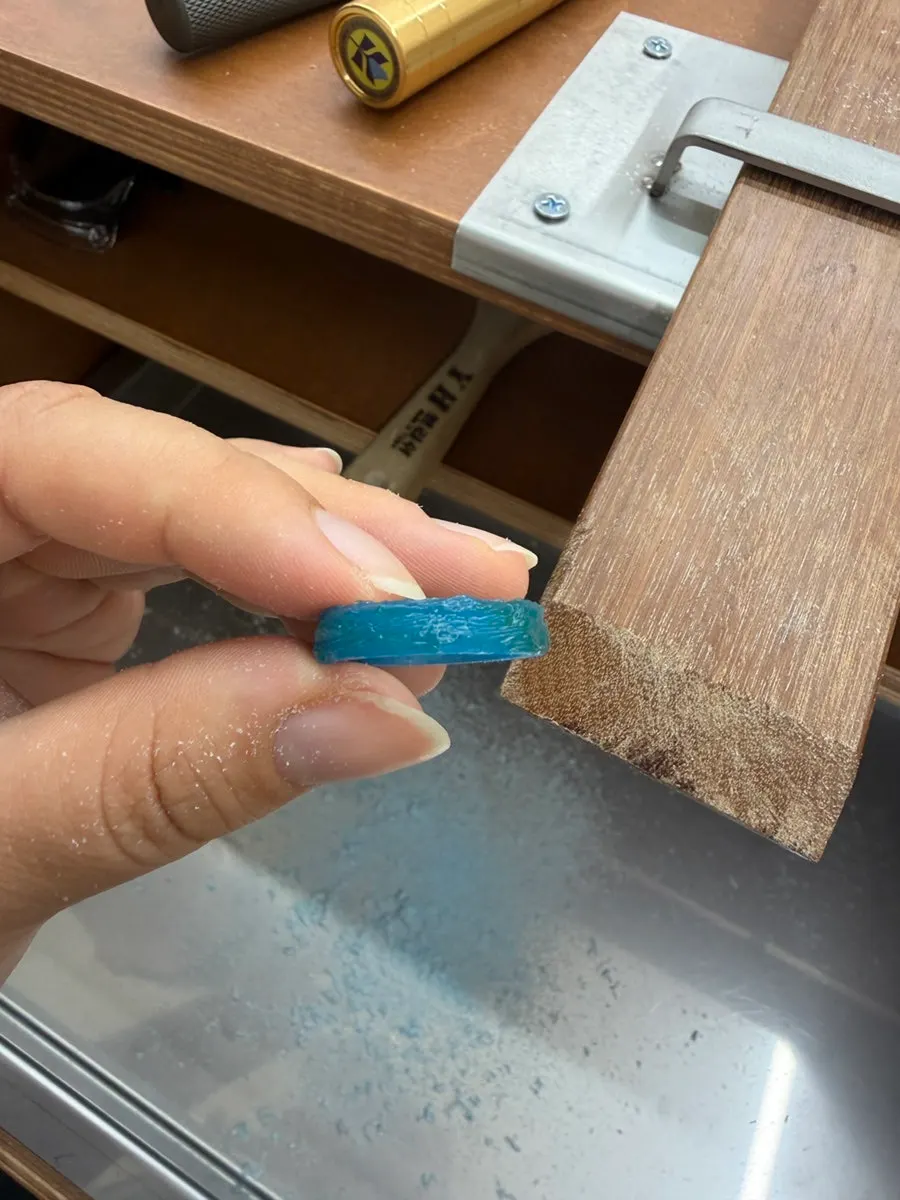 Wax ring with the wave pattern being carved in