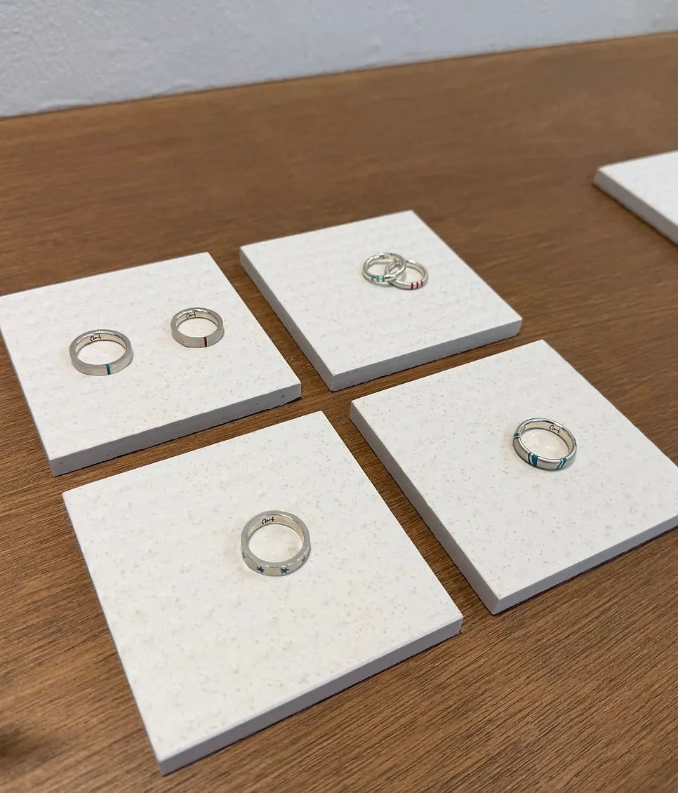 Handmade rings displayed at the workshop