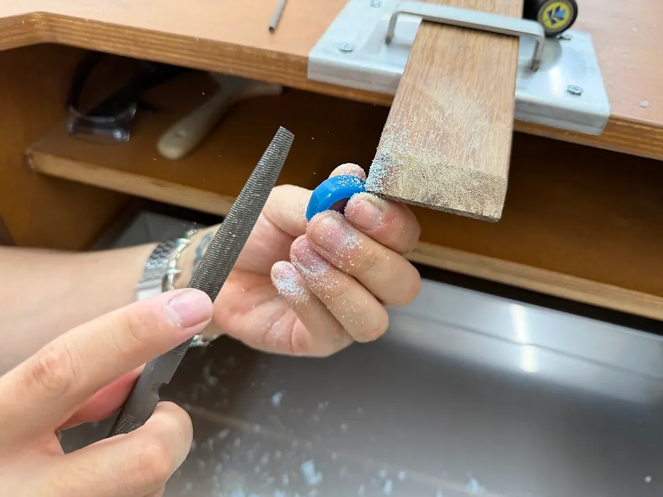 Filing down the wax ring's thickness