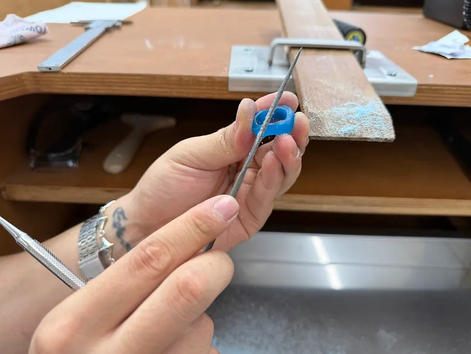 Carving along the design line with a carving tool