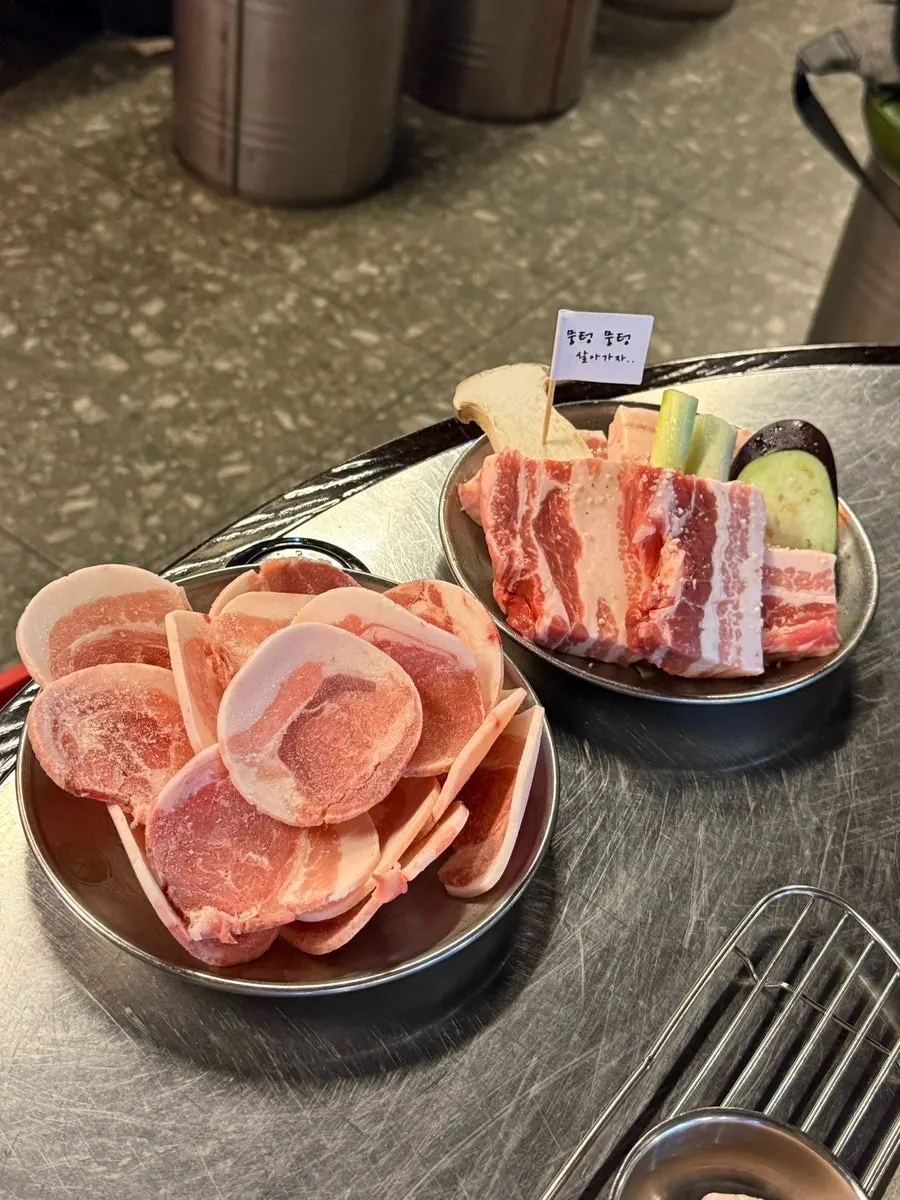 Plate of ordered juicy pork belly and today's special cut