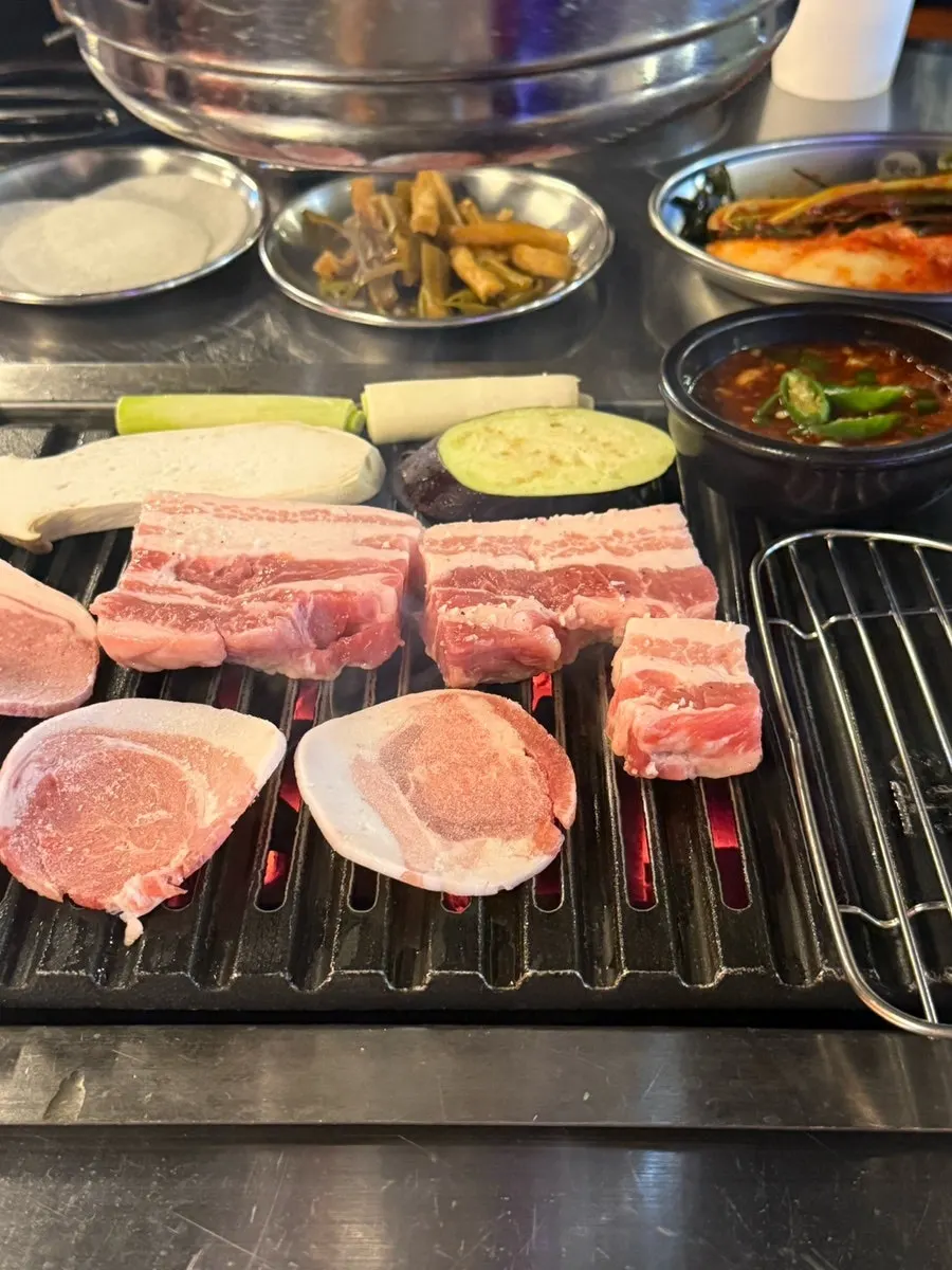 Thick pork belly on the charcoal grill