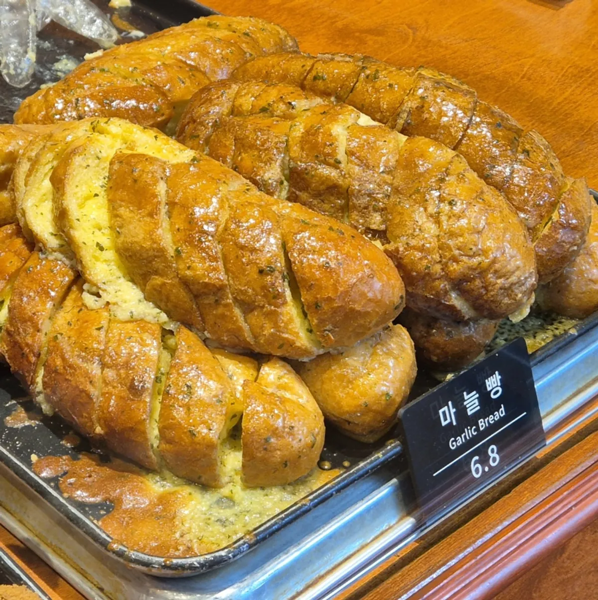 Garlic bread packed to go from Munhwa Bakery