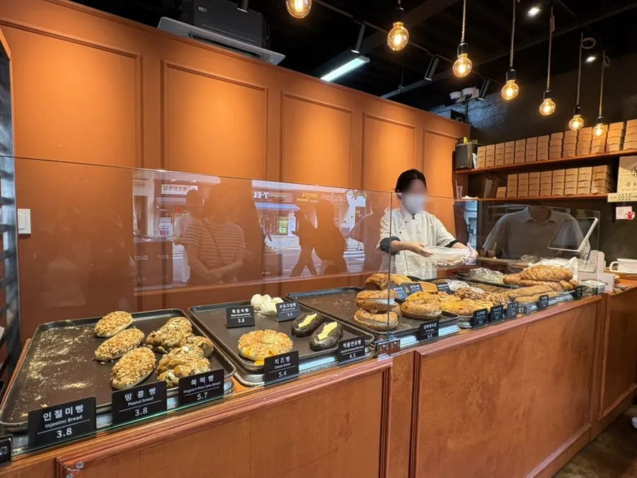 Bread display shelves inside Munhwa Bakery