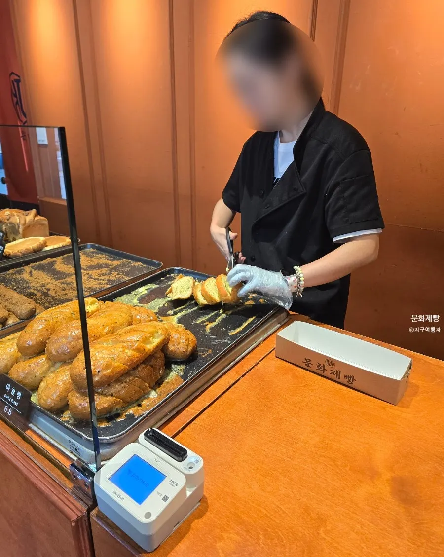 Munhwa Bakery's signature coffee bread and garlic bread on display