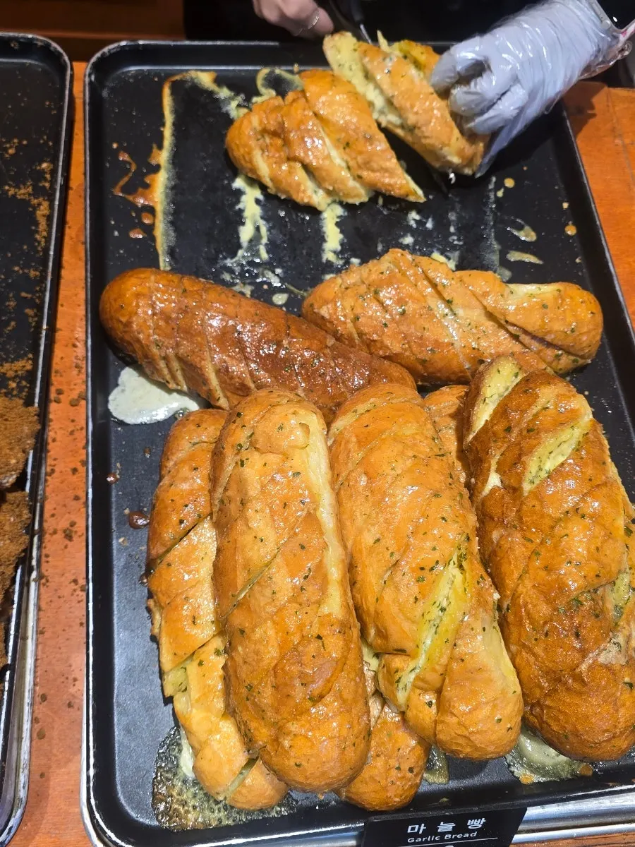 Garlic baguette sliced neatly for packaging