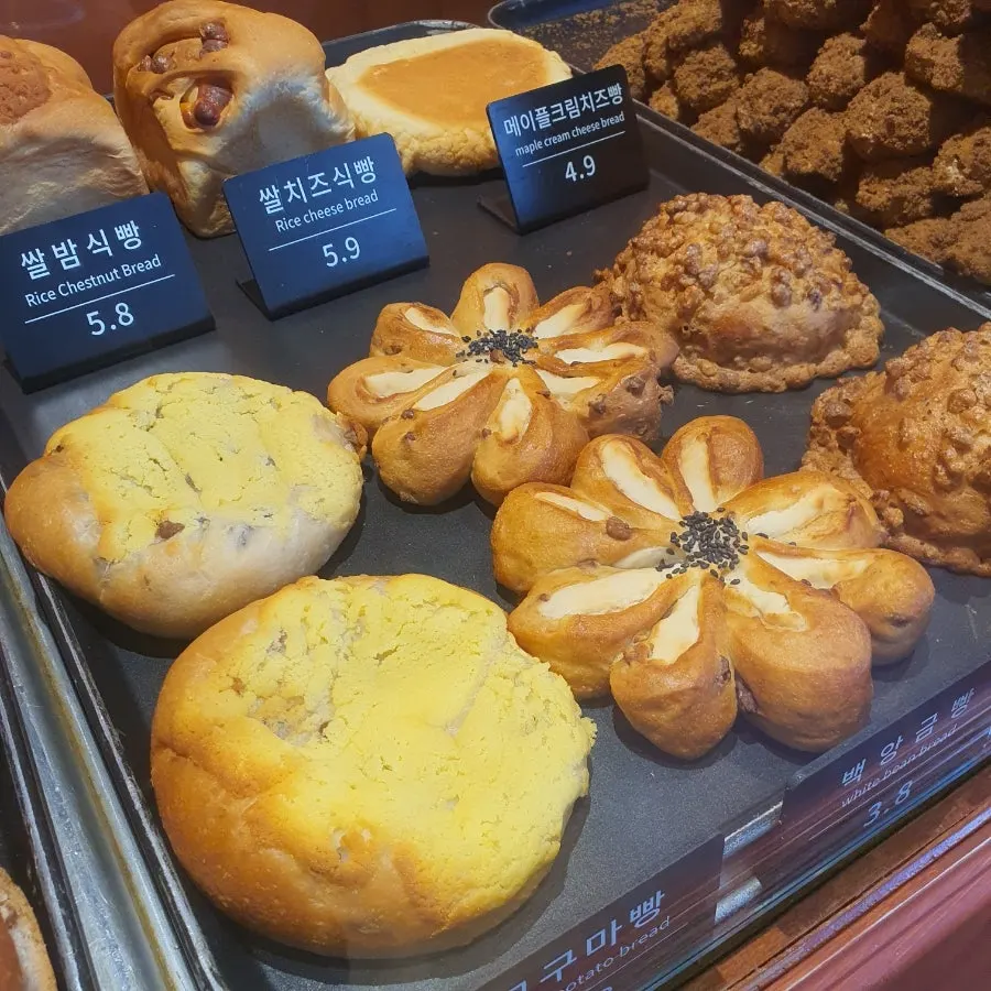 Price list for garlic bread, coffee bread, and onion bagel