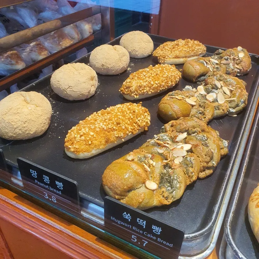 Two kinds of Munhwa Bakery bread set on a table