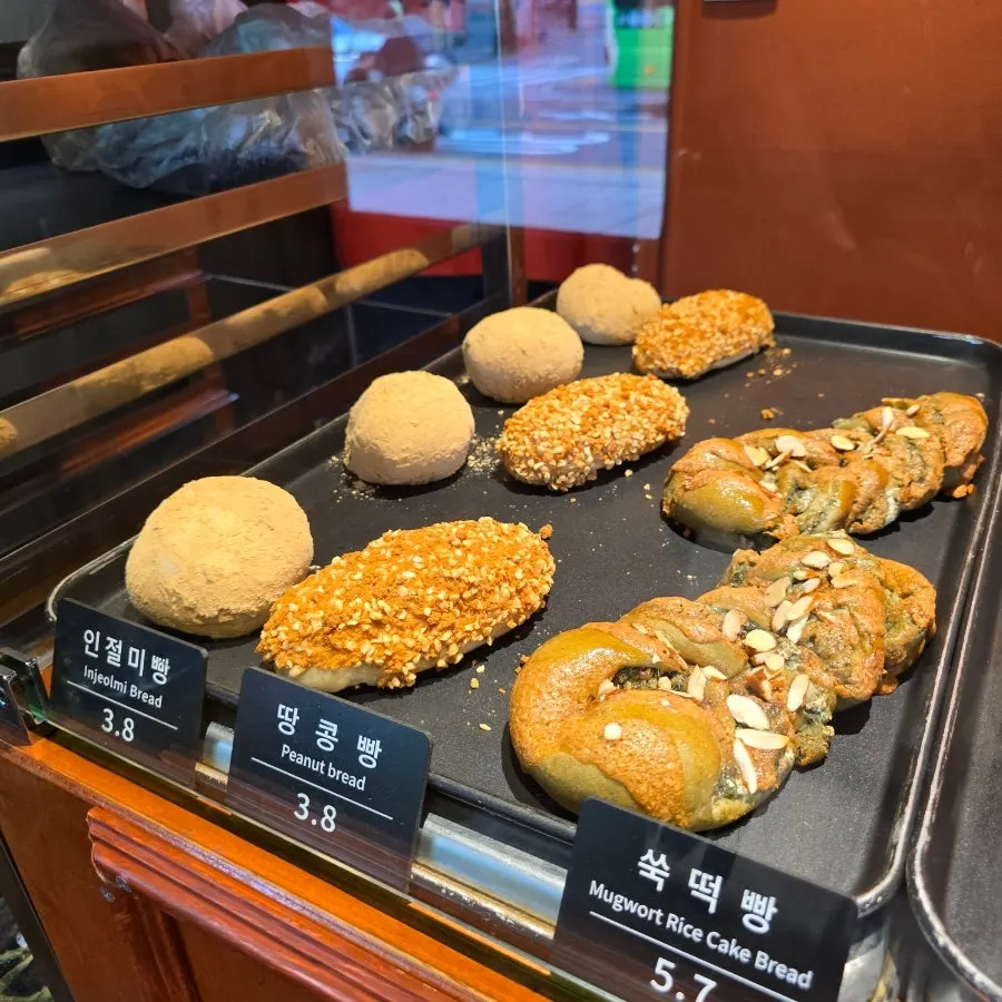 A same-day-baked bread pilgrimage lineup at Munhwa Bakery
