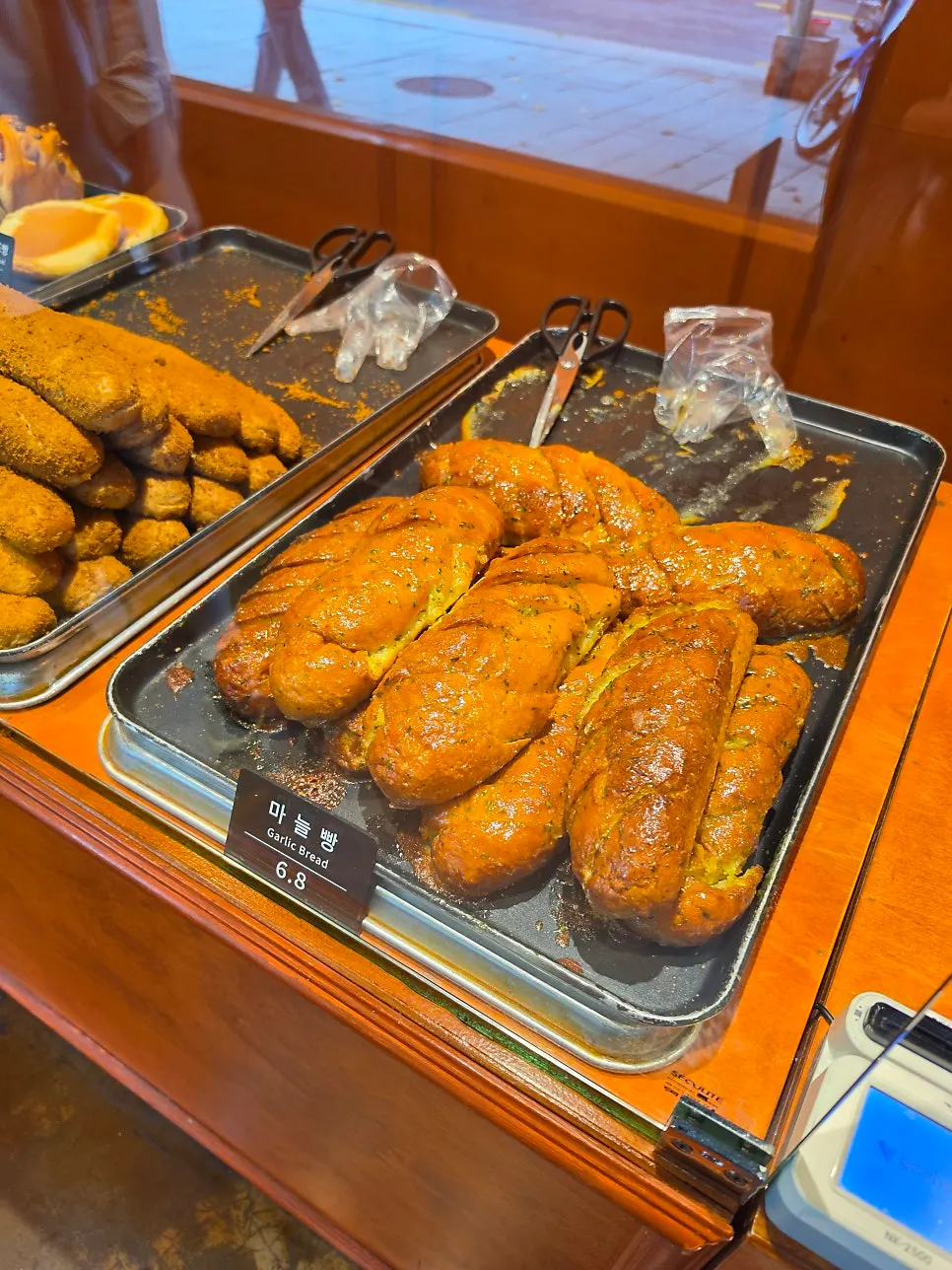 Glossy garlic bread on display