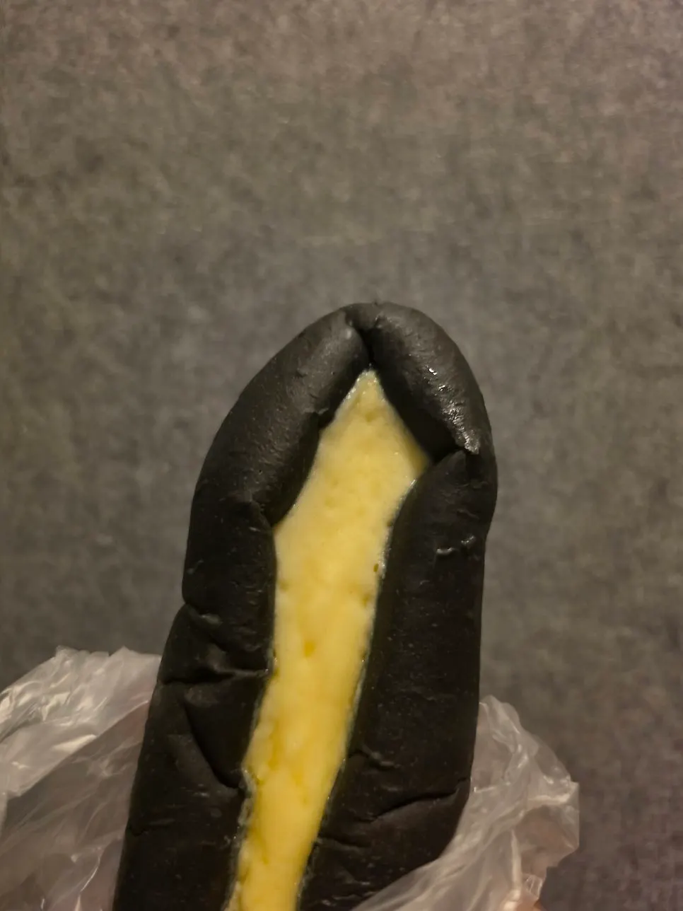 Close-up of the chewy squid ink condensed milk bread