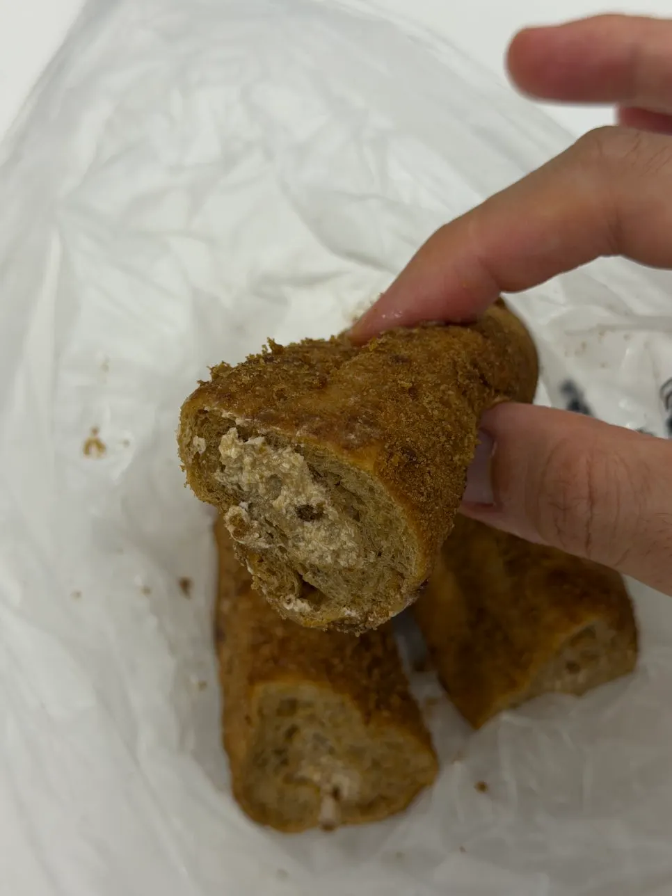 Coffee bread placed next to a cup of coffee