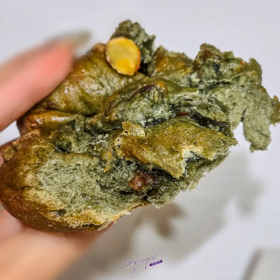 Mugwort rice cake bread with visible nuts and rice cake texture