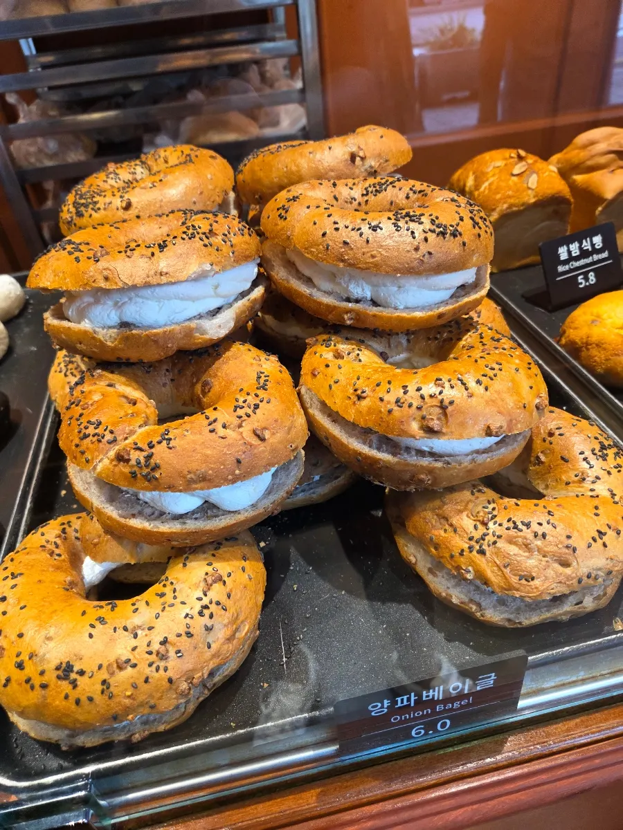 Black-sesame-topped onion bagel at Munhwa Bakery