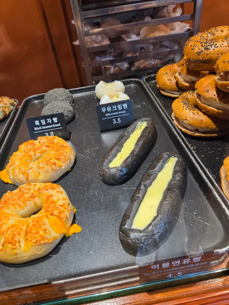 Display with black sesame bread and squid ink condensed-milk bread