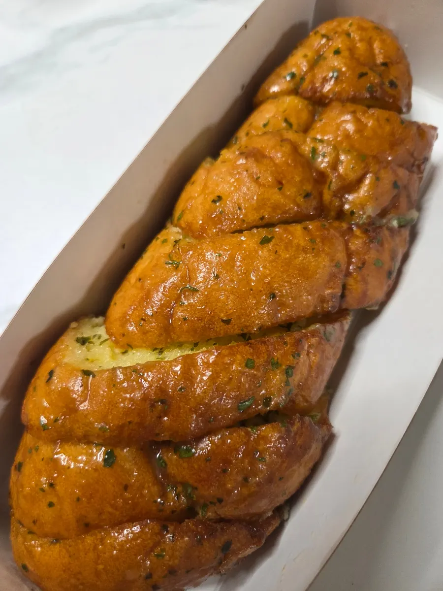 Garlic bread box and onion bagel brought home
