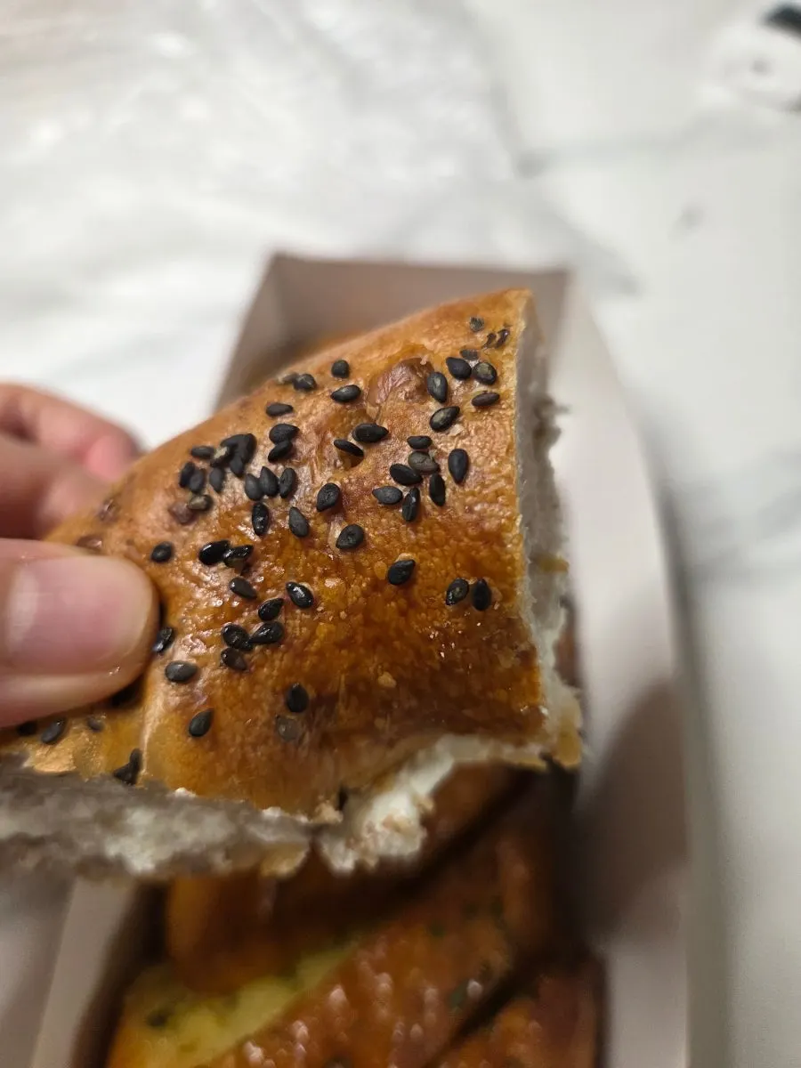 Chewy dough of the Munhwa Bakery onion bagel