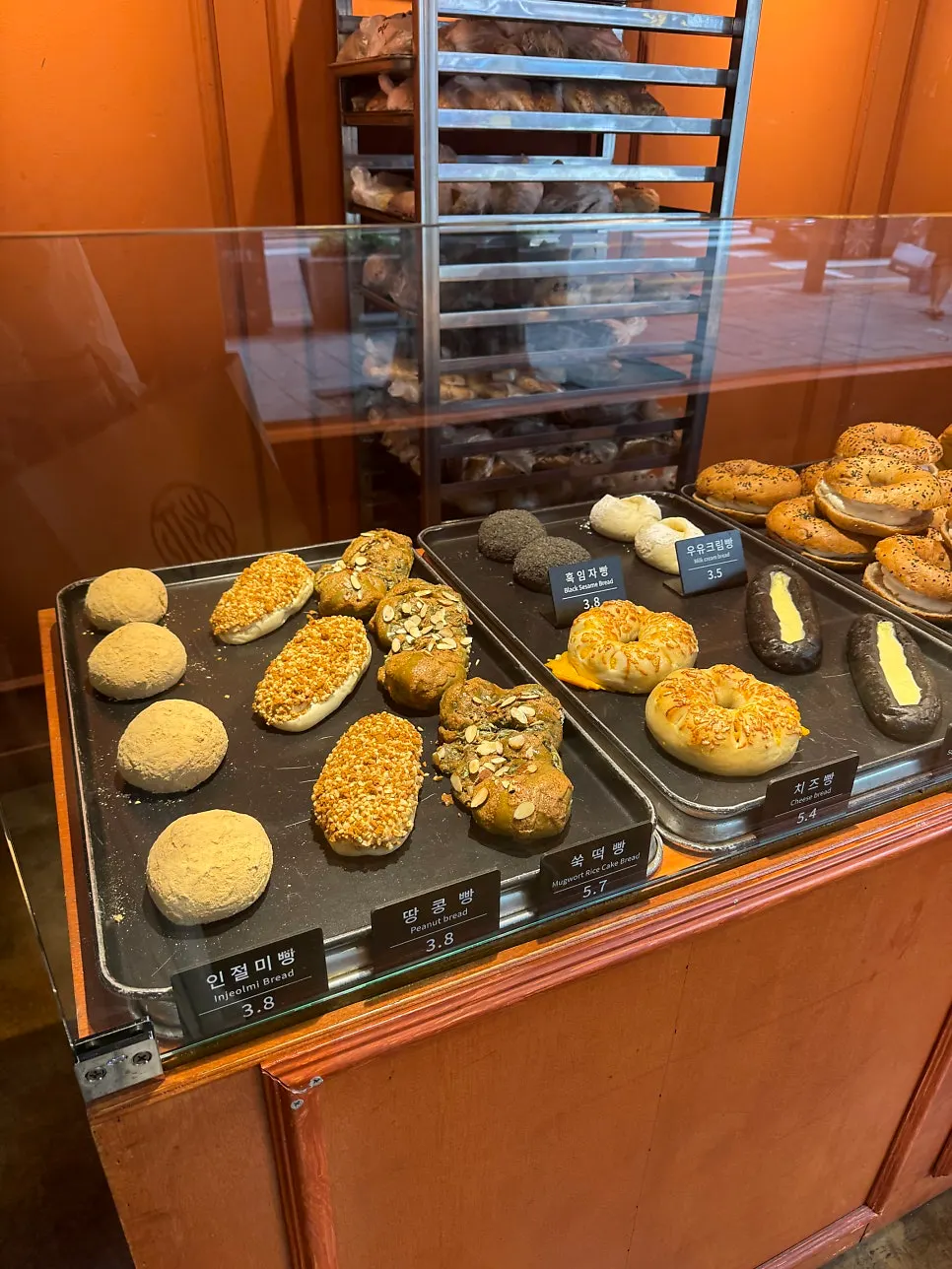 Display shelf with nut breads and garlic bread