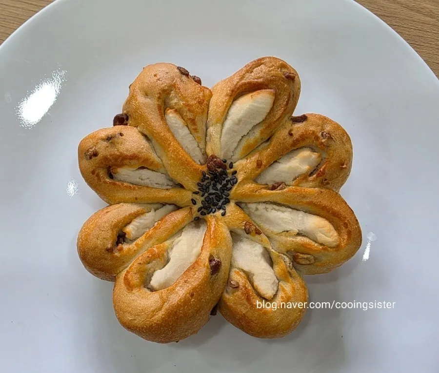 Cross-section of white bean paste bread packed with filling