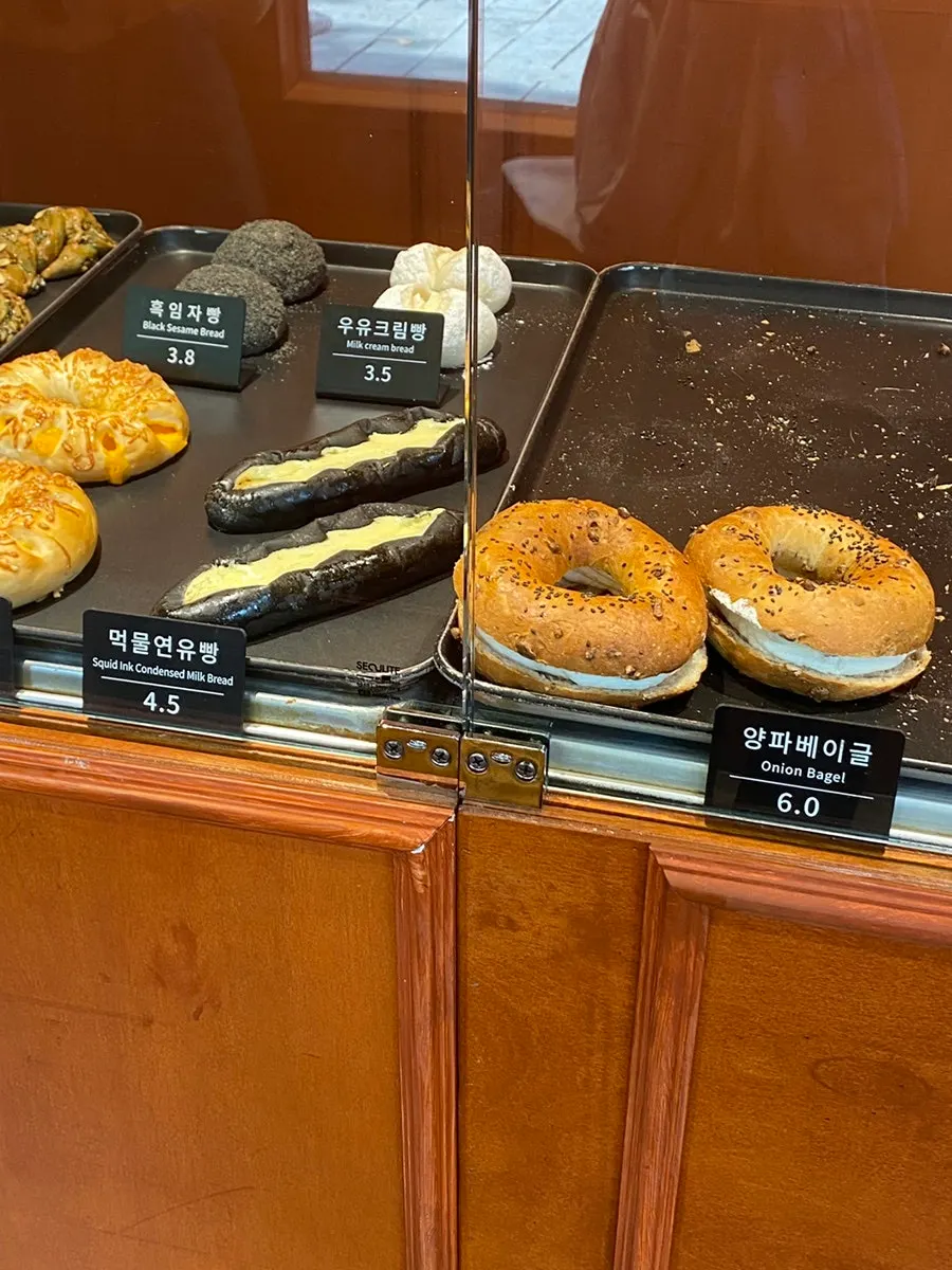 Onion bagels on display at Munhwa Bakery
