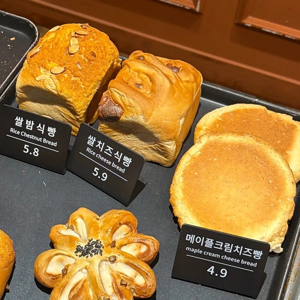 White bean paste bread, rice cheese bread and other loaves on display