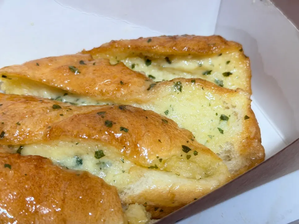 Garlic bread and rice chestnut bread unwrapped at home