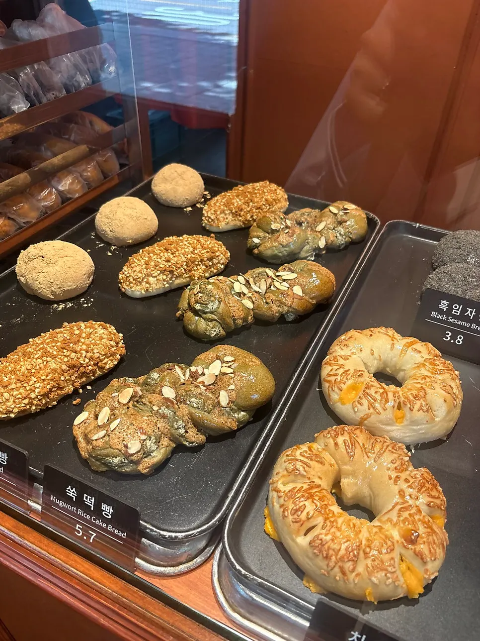 Shelf with fluffy cream breads