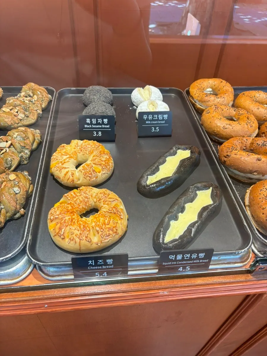 Assorted breads displayed on Munhwa Bakery's shelves