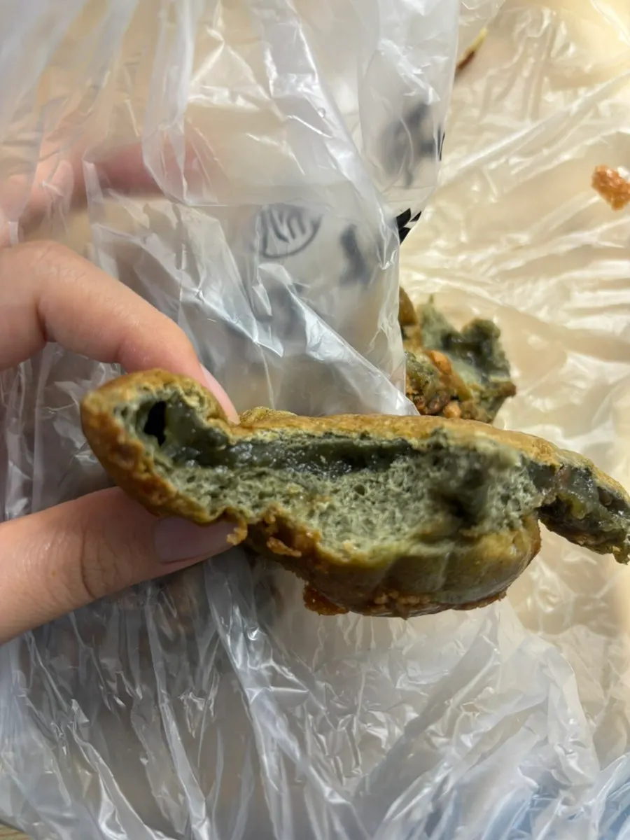 A piece of coffee bread showing its moist interior