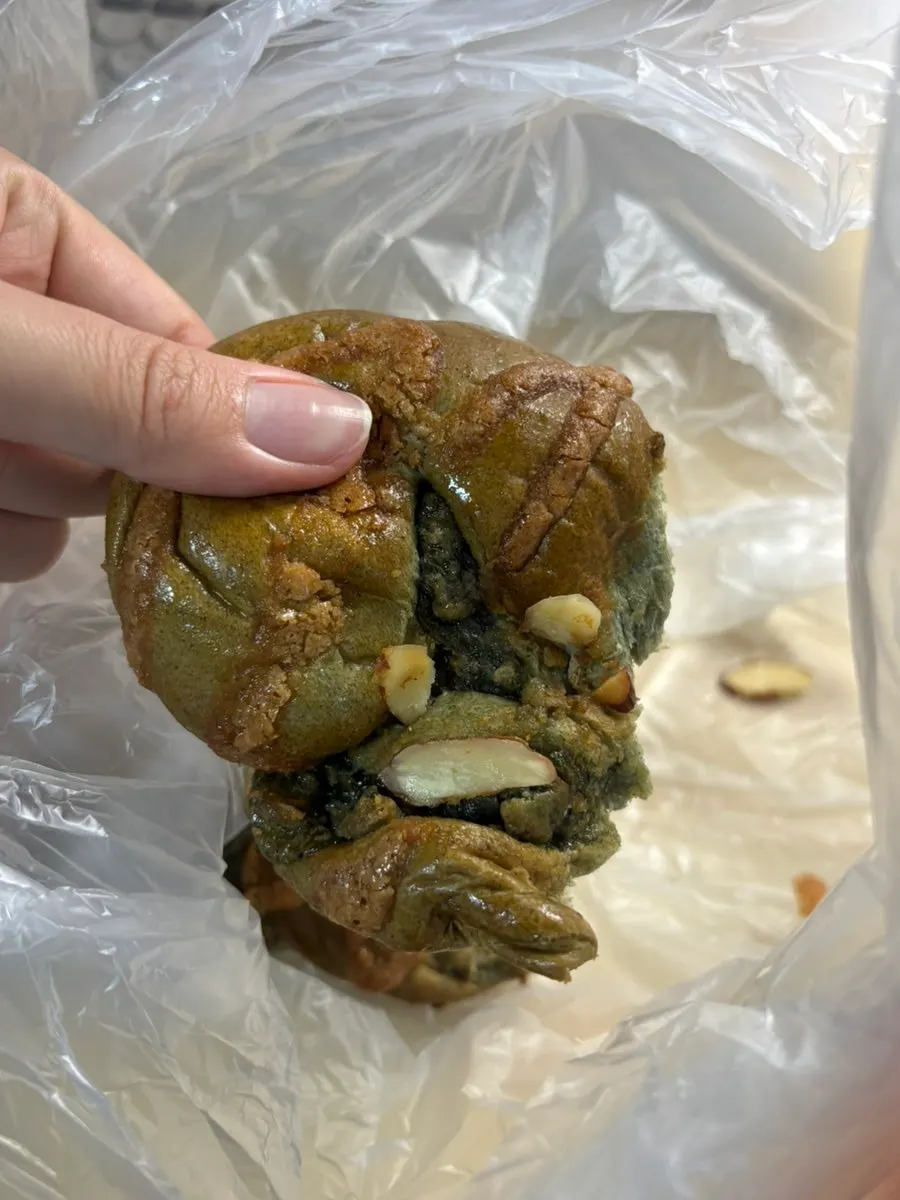 Cross-section of Munhwa Bakery's mugwort rice cake bread showing the rice cake filling