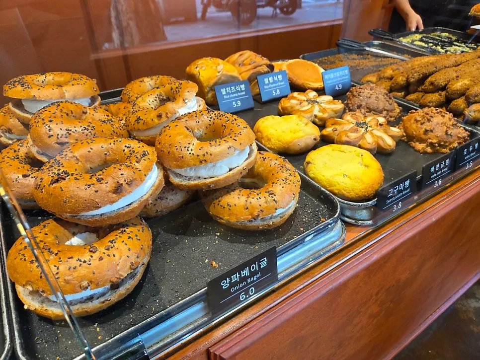 Bread displayed on shelves at Munhwa Bakery