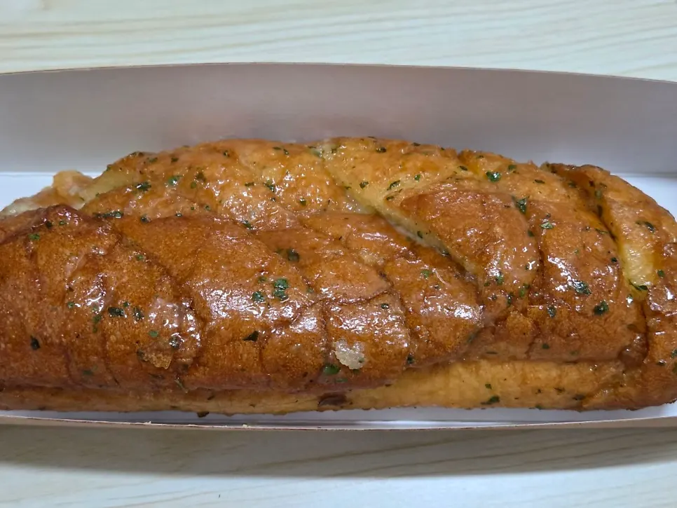 Garlic bread from Munhwa Bakery soaked with garlic butter
