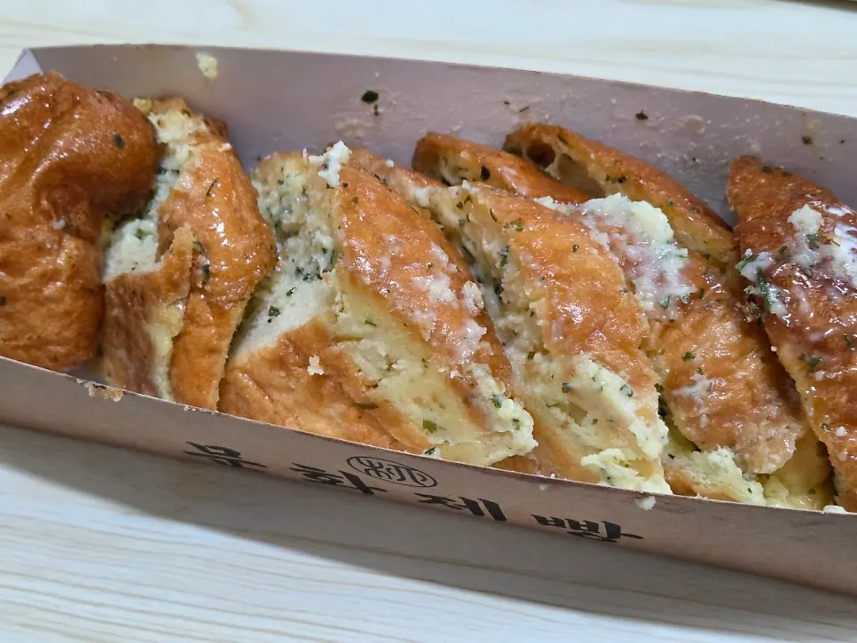 Golden-browned exterior of the garlic bread