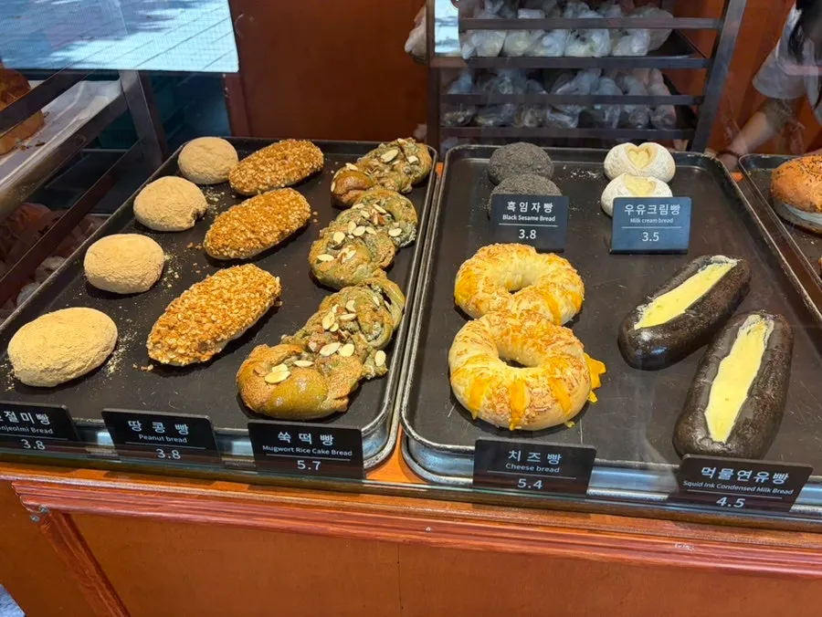 Breads and price list at Munhwa Bakery's display case