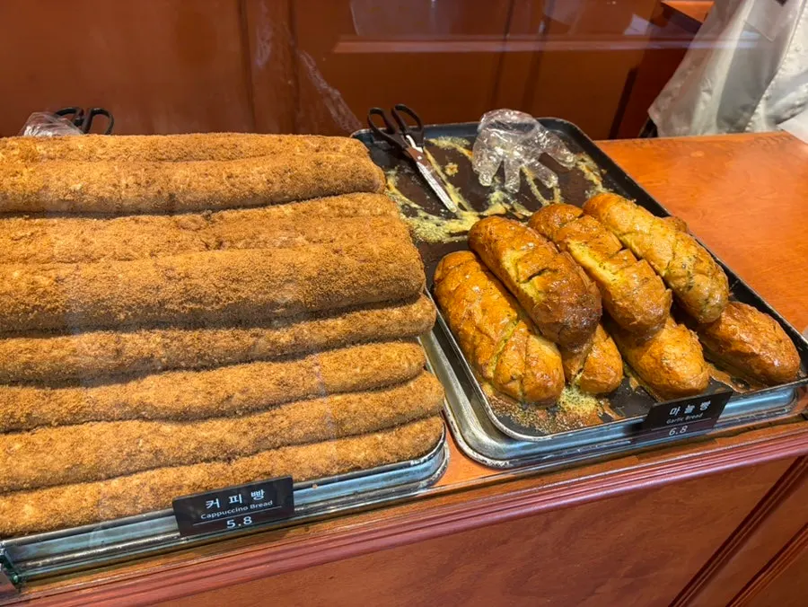 Signature coffee bread and garlic bread on display