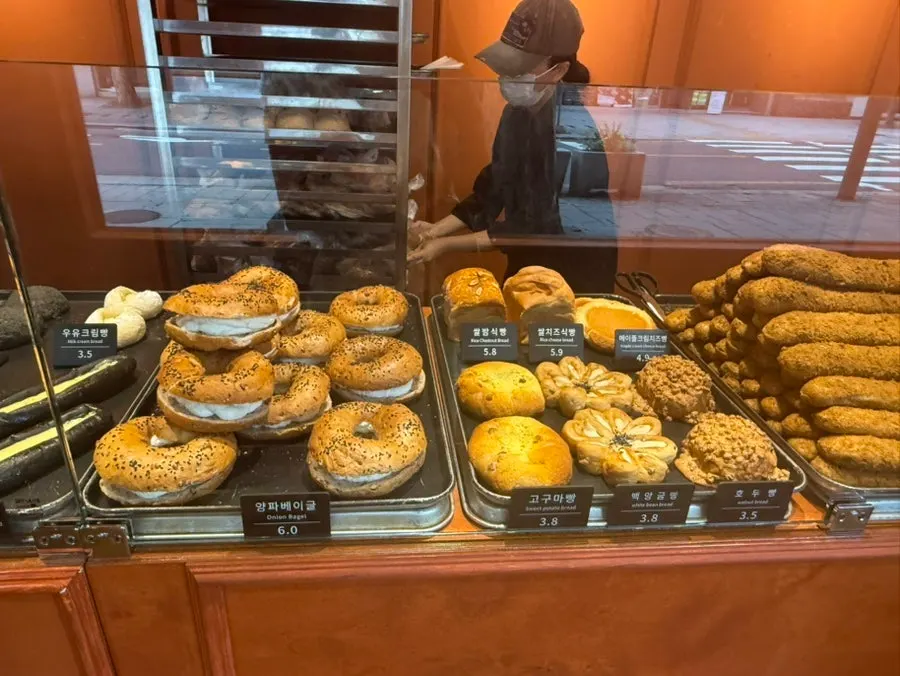 Bag of bread packed to go from Munhwa Bakery