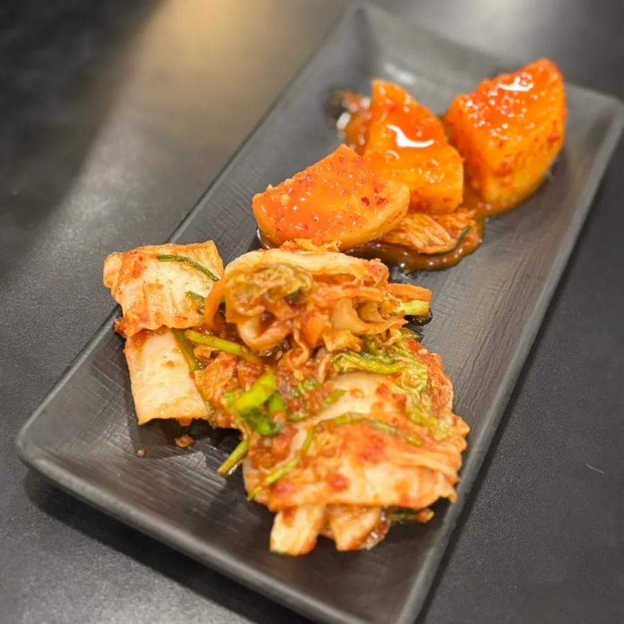 A plate of house-made domestic napa cabbage kimchi