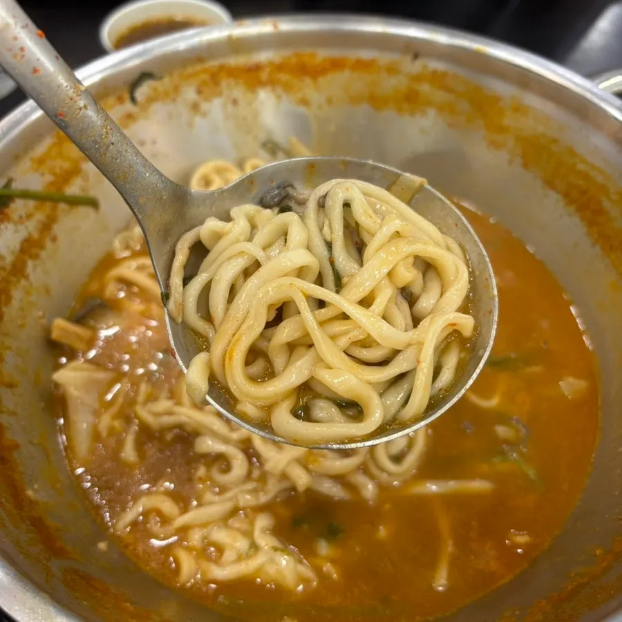 A bowl of spicy shabu kalguksu served up